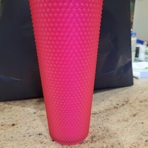 Starbucks pink venti tumbler.